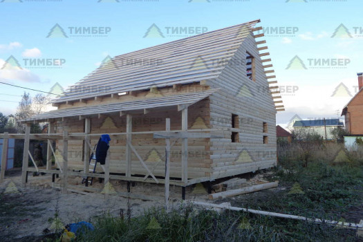 Дом из бруса под блок хаус